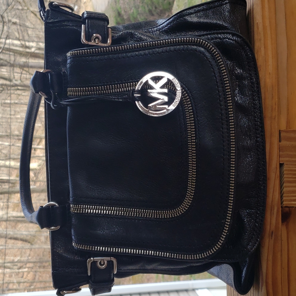 Black Leather Michael Kors handbag.